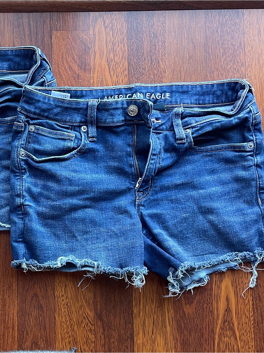 American Eagle Outfitters Dark Indigo Frayed Hem Denim Shorts - Women